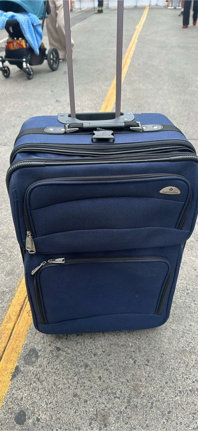 Samsonite Blue Rolling Suitcase