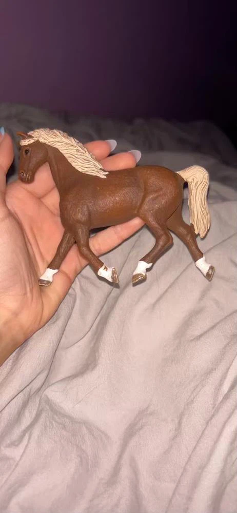 Brown horse toy with white socks