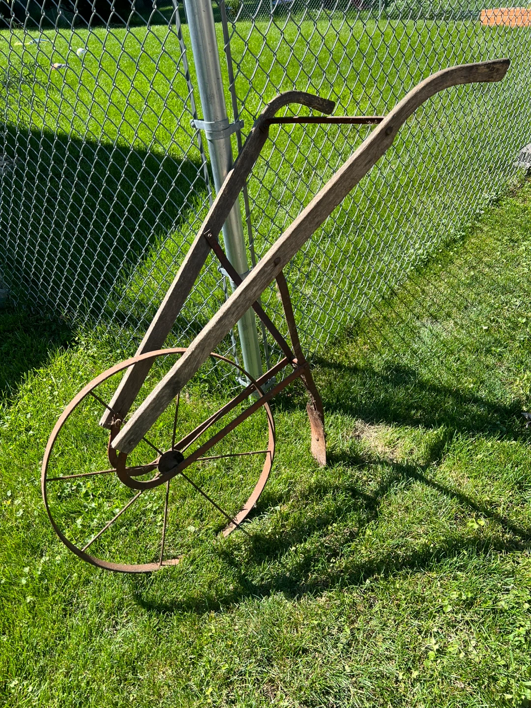 Antique Single Wheel Plow Lawn Ornament