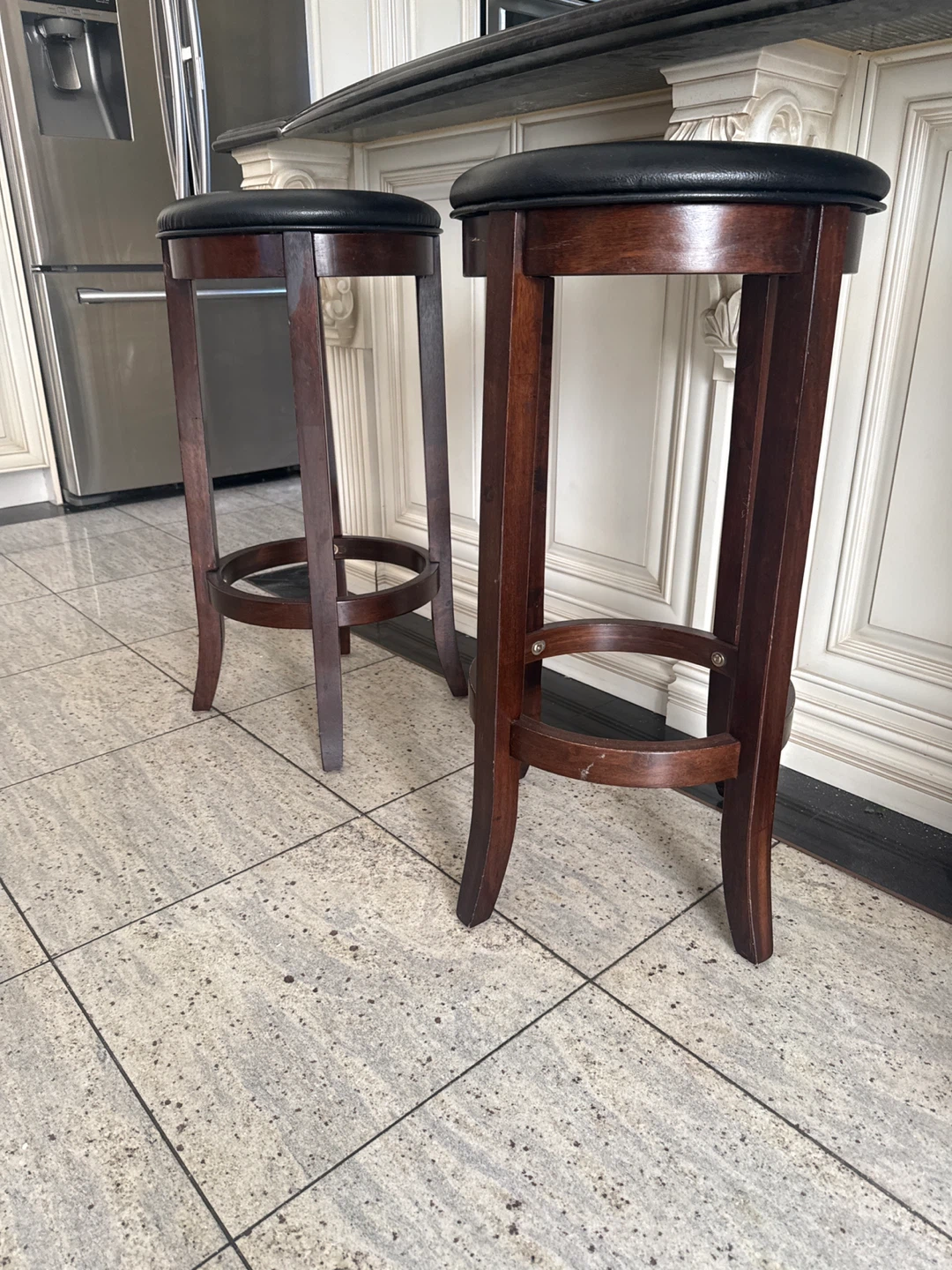 2 Dark Wood Bar Stools with Black Upholstered Seats