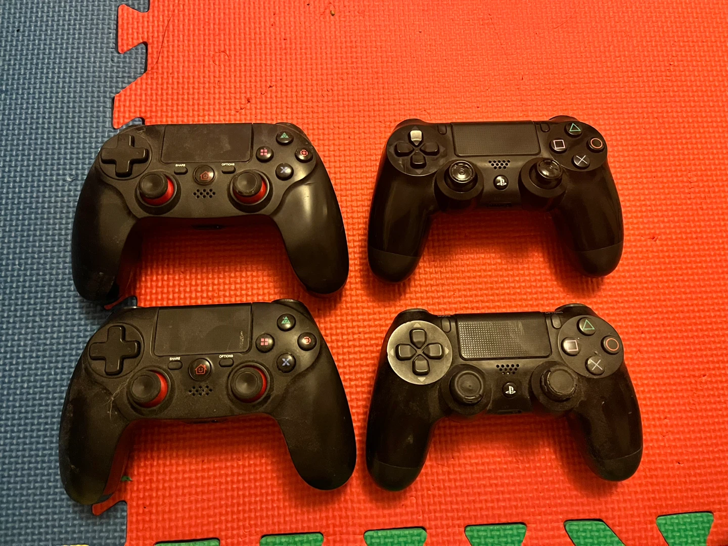 Four (4) Sony PlayStation 4 DualShock Controllers