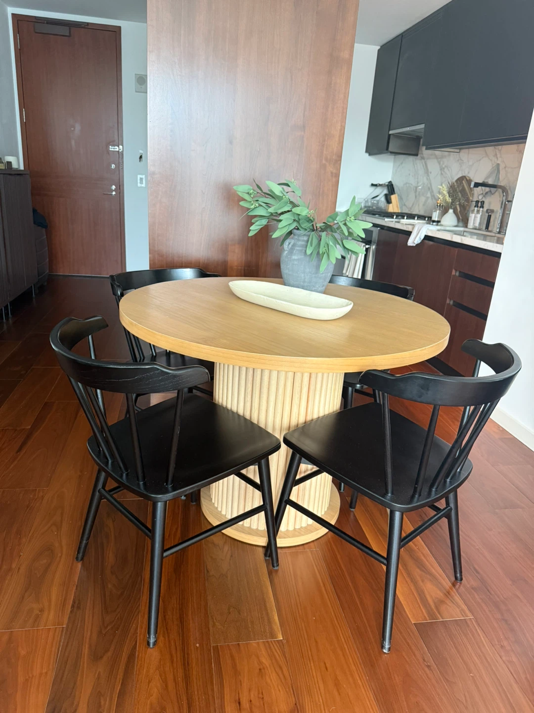 Wooden Round Dining Table with 5 Black Chairs