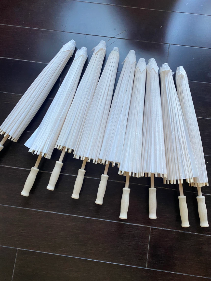 9 White Paper Umbrellas -23.62”