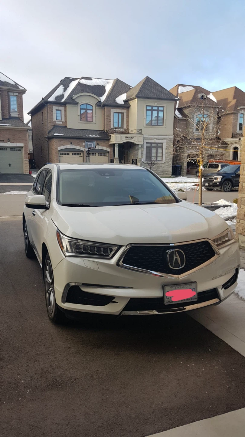 White Acura SUV