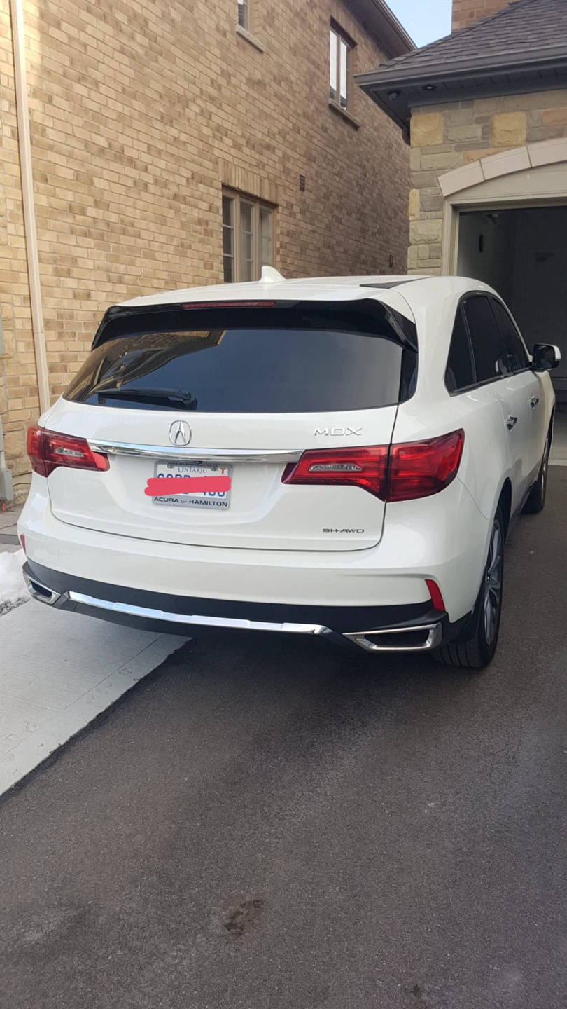 White Acura SUV - photo 2
