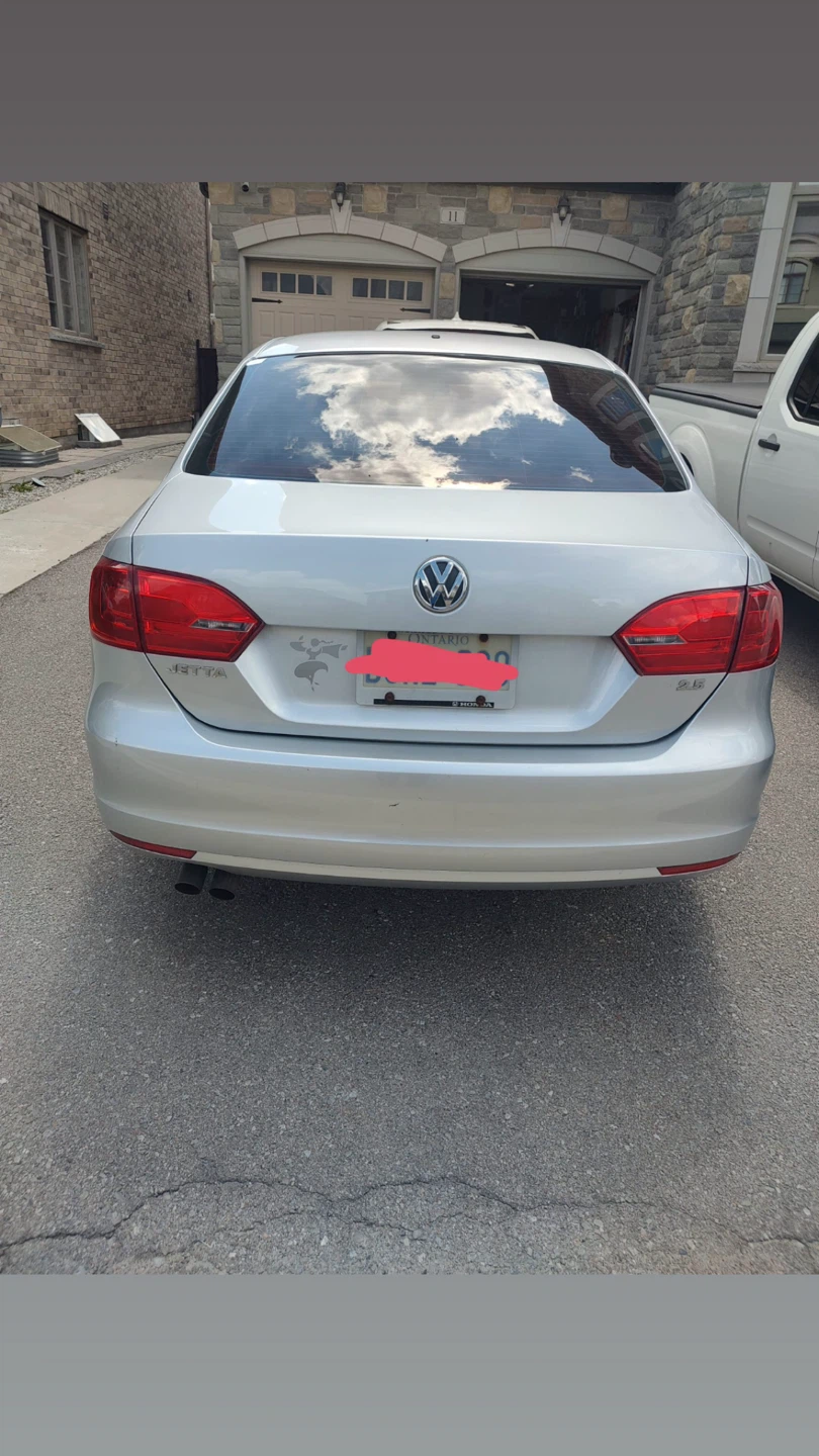 Silver Volkswagen Jetta Car