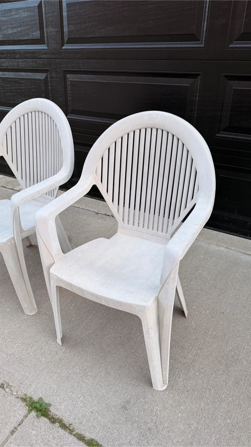 Two white plastic patio chairs - photo 3