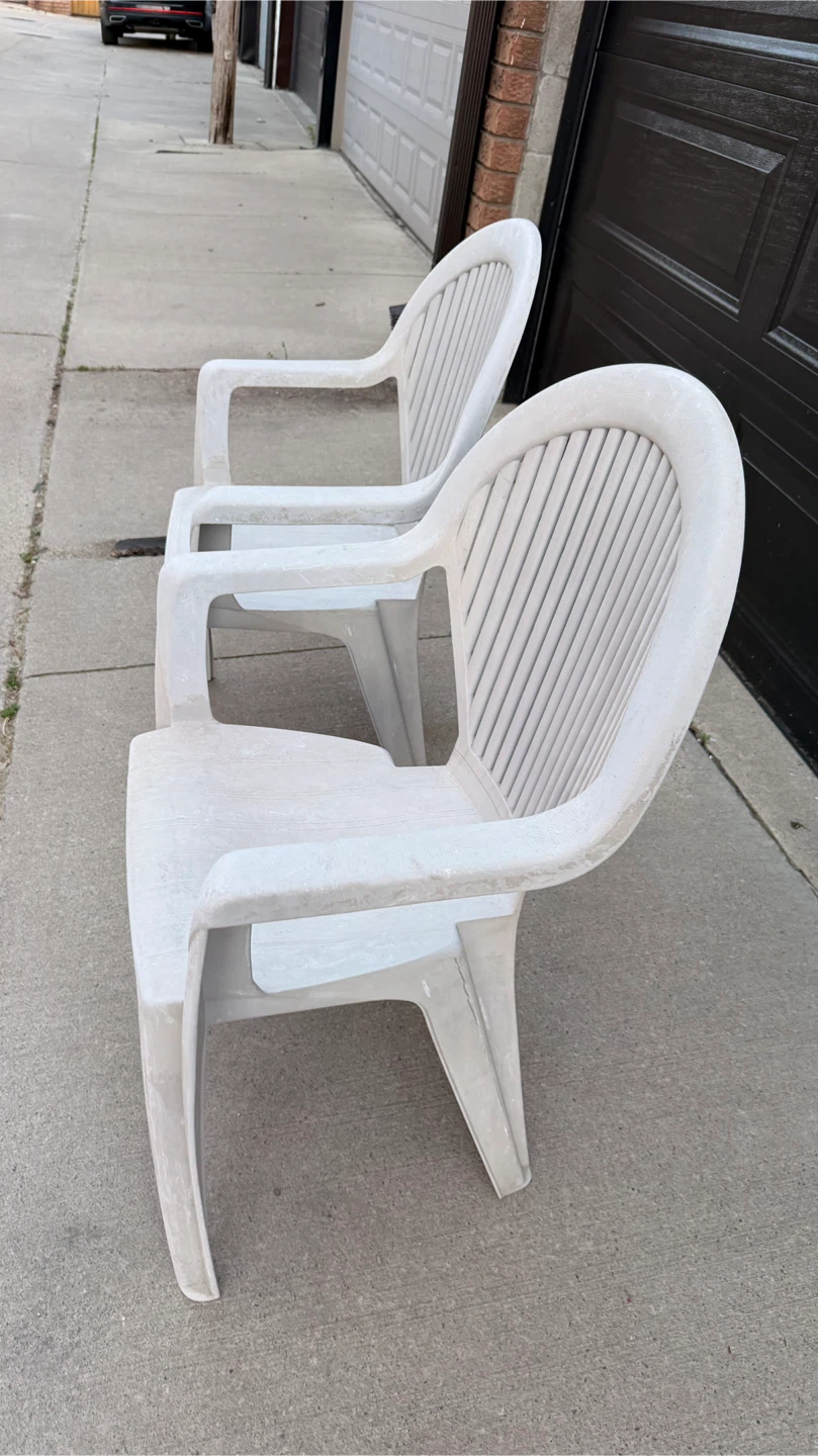 Two white plastic patio chairs - photo 5