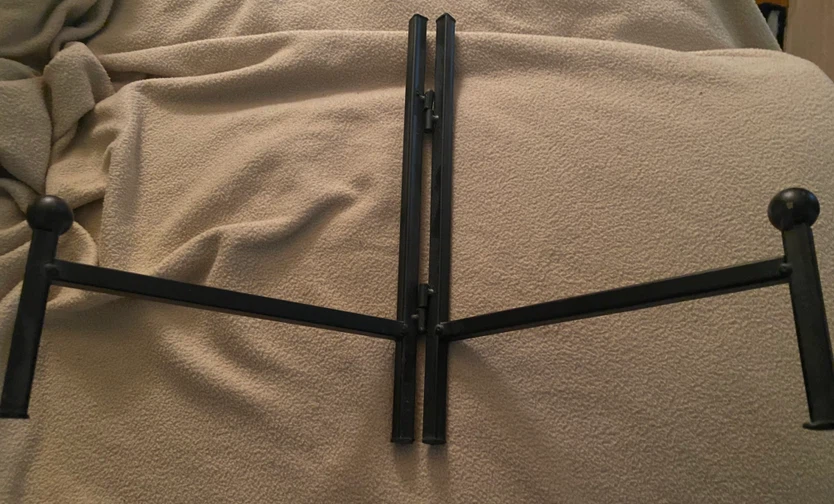 Black metal plate stand