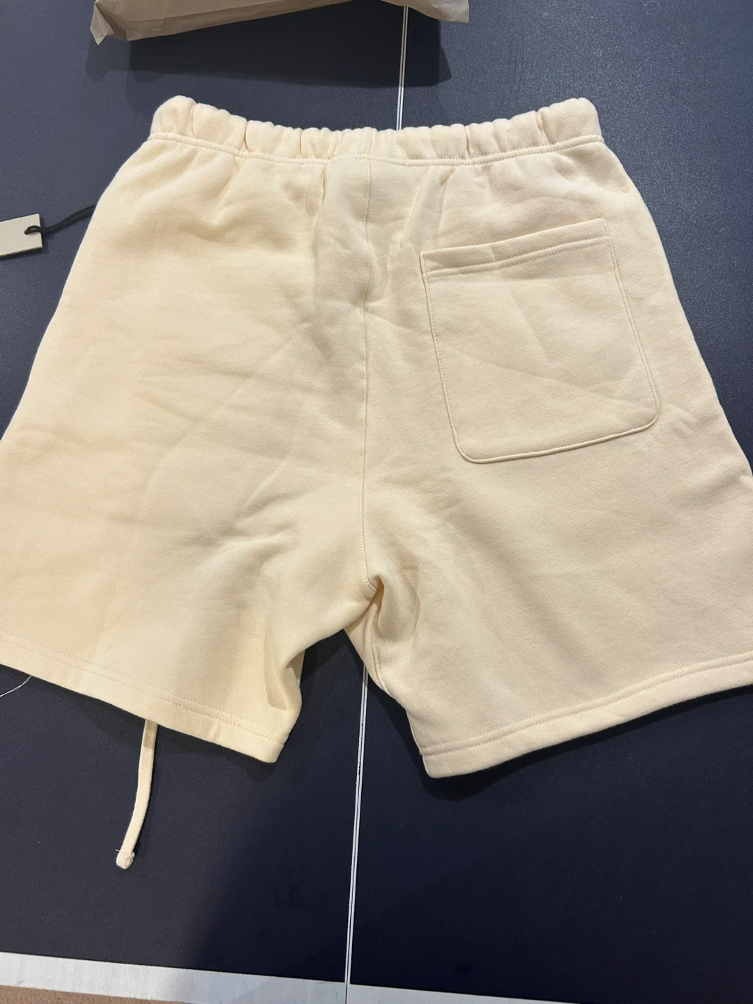 Fear of God Essentials Cream Sweat Shorts - photo 5