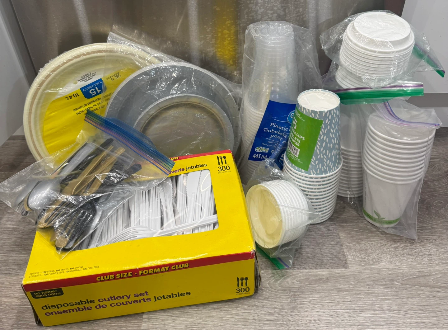 Paper/Plastic plates, cups w/lids, utensils