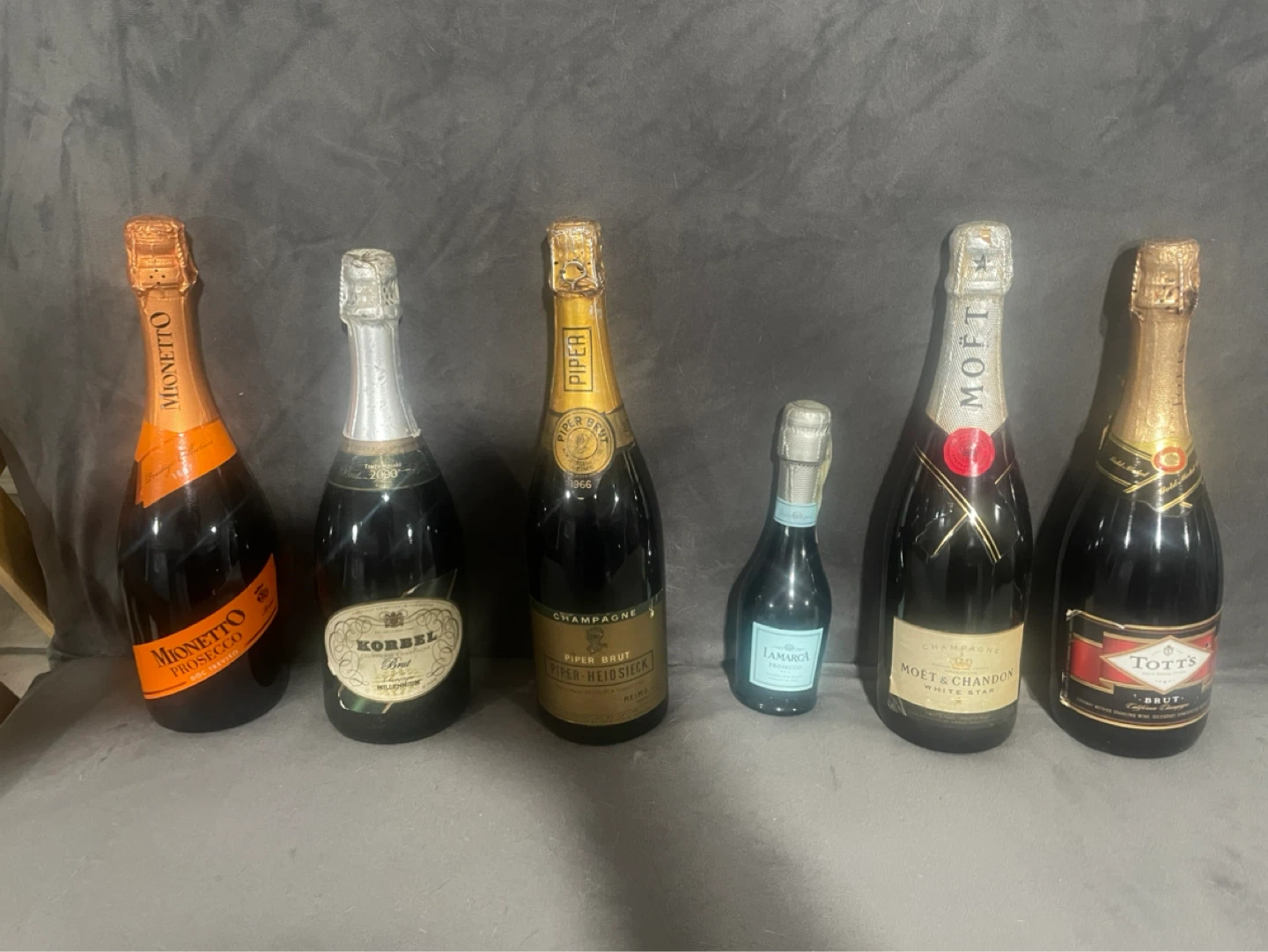 Assorted Champagne and Prosecco Bottles