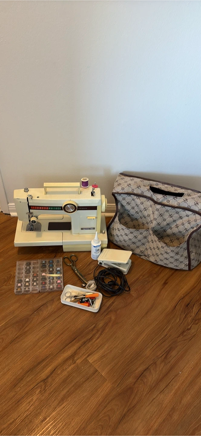 White Sewing Machine with Accessories and Bag