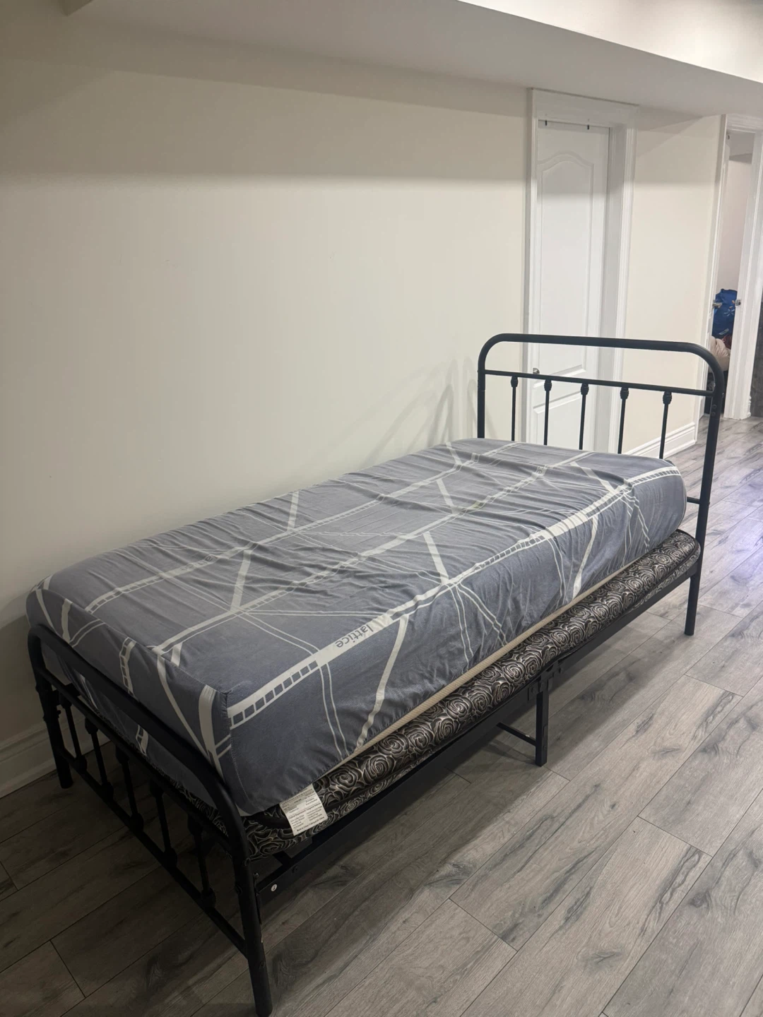Twin bed fame with mattress and fleece sheet set