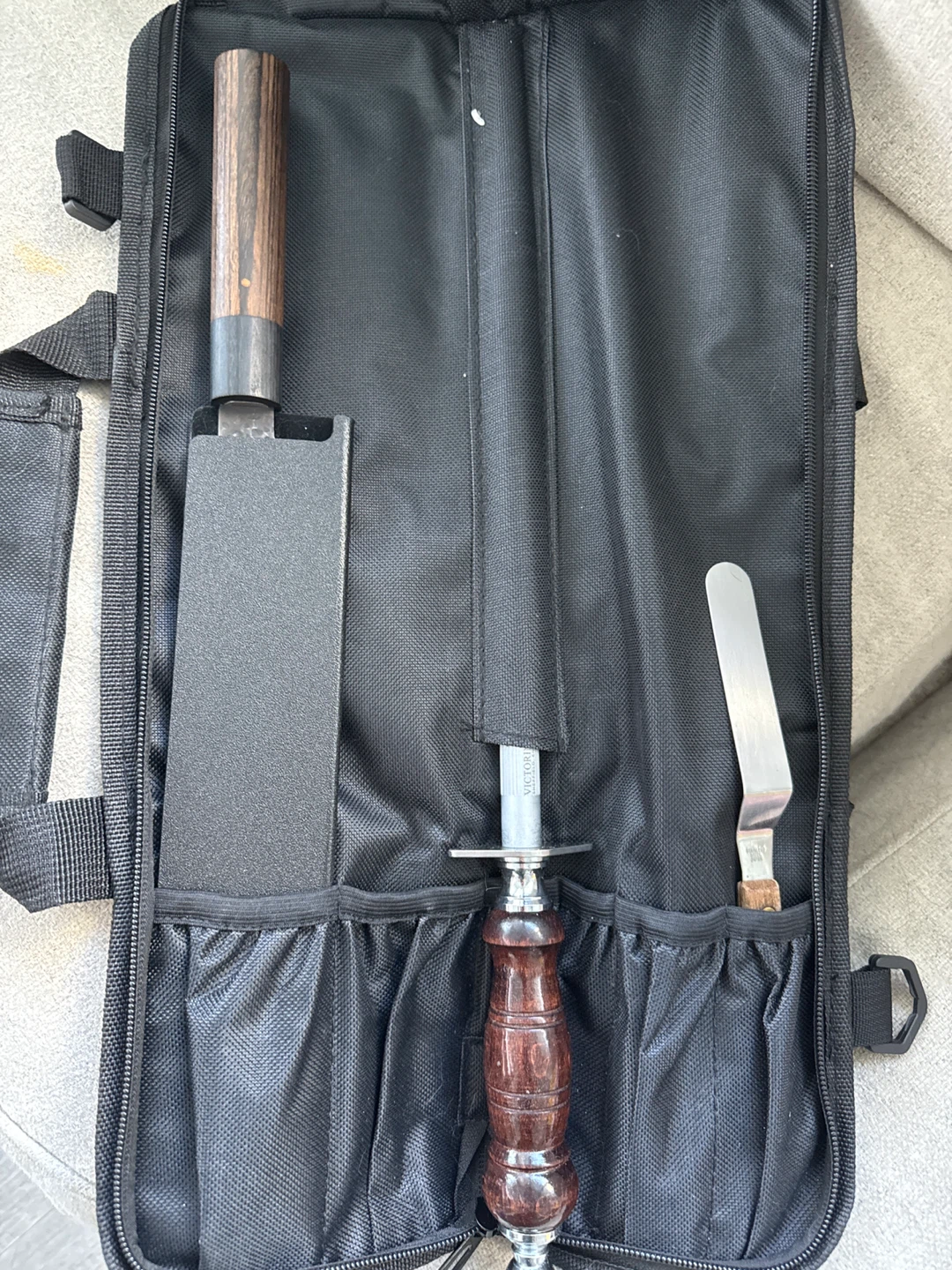 George brown Knife Roll Bag with Assorted Utensils