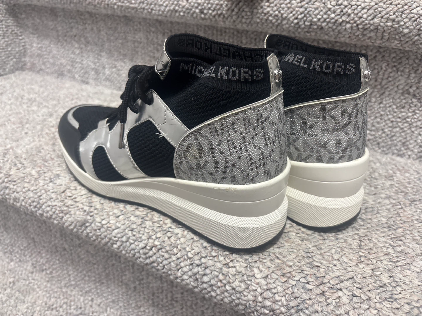 Brand new Michael Kors Black & Silver Wedge Sneakers