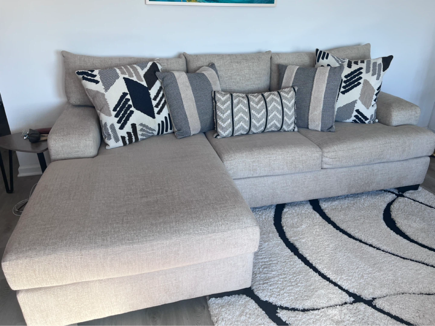 Light Beige Sectional Sofa with Decorative Pillows