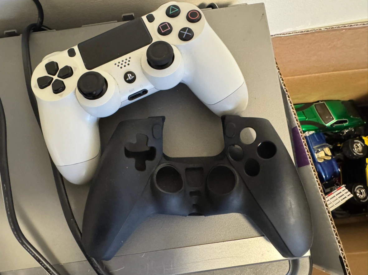PS4 Wireless Controller and gel cover. .