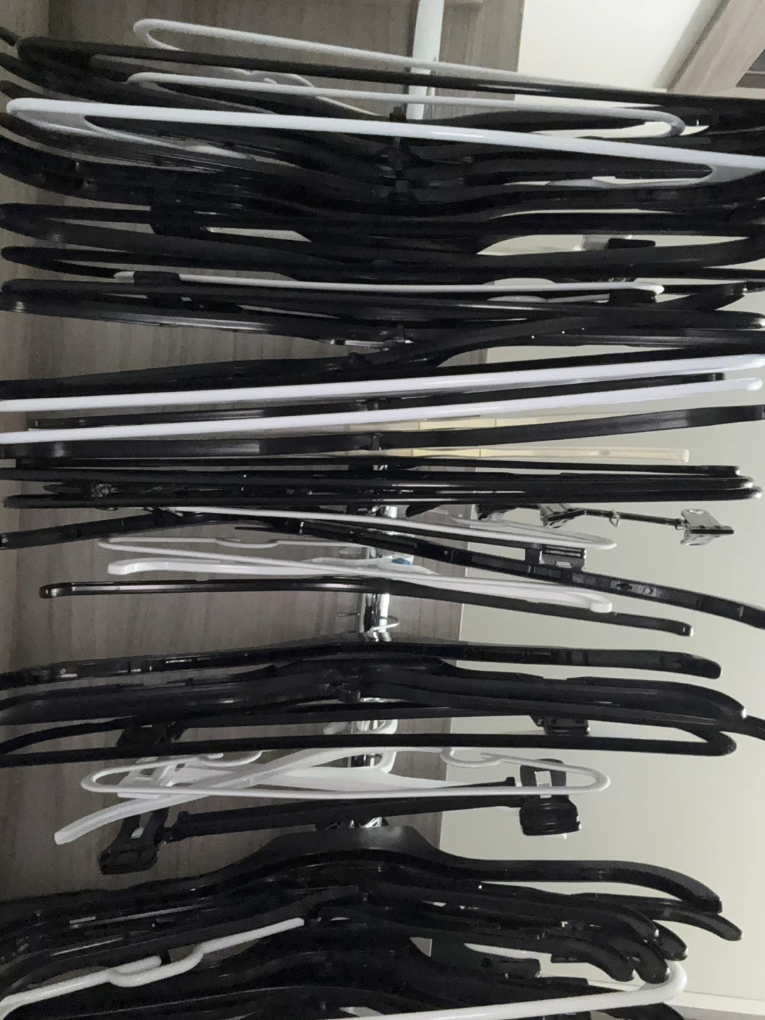 ~55-60 Assorted Clothes Hangers