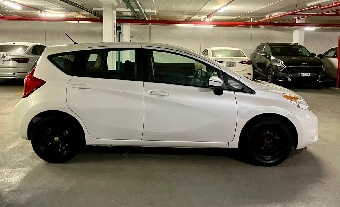 2015 Nissan Versa Note with safety and warranty included. - photo 5