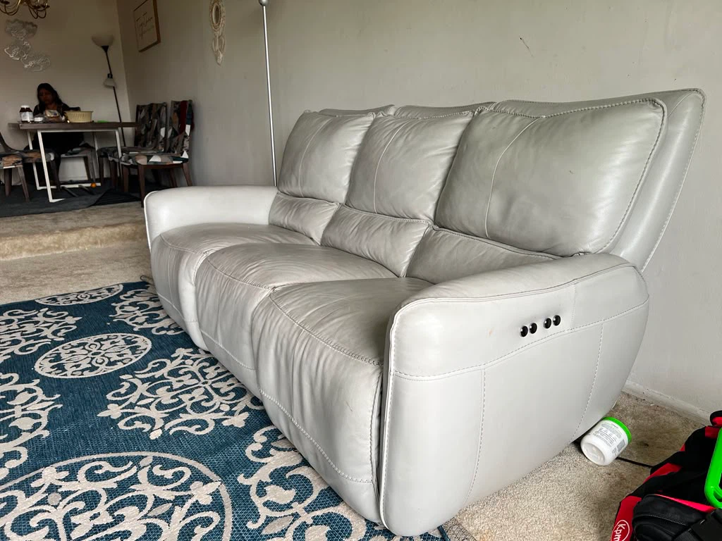 Gray Leather Reclining Sofa