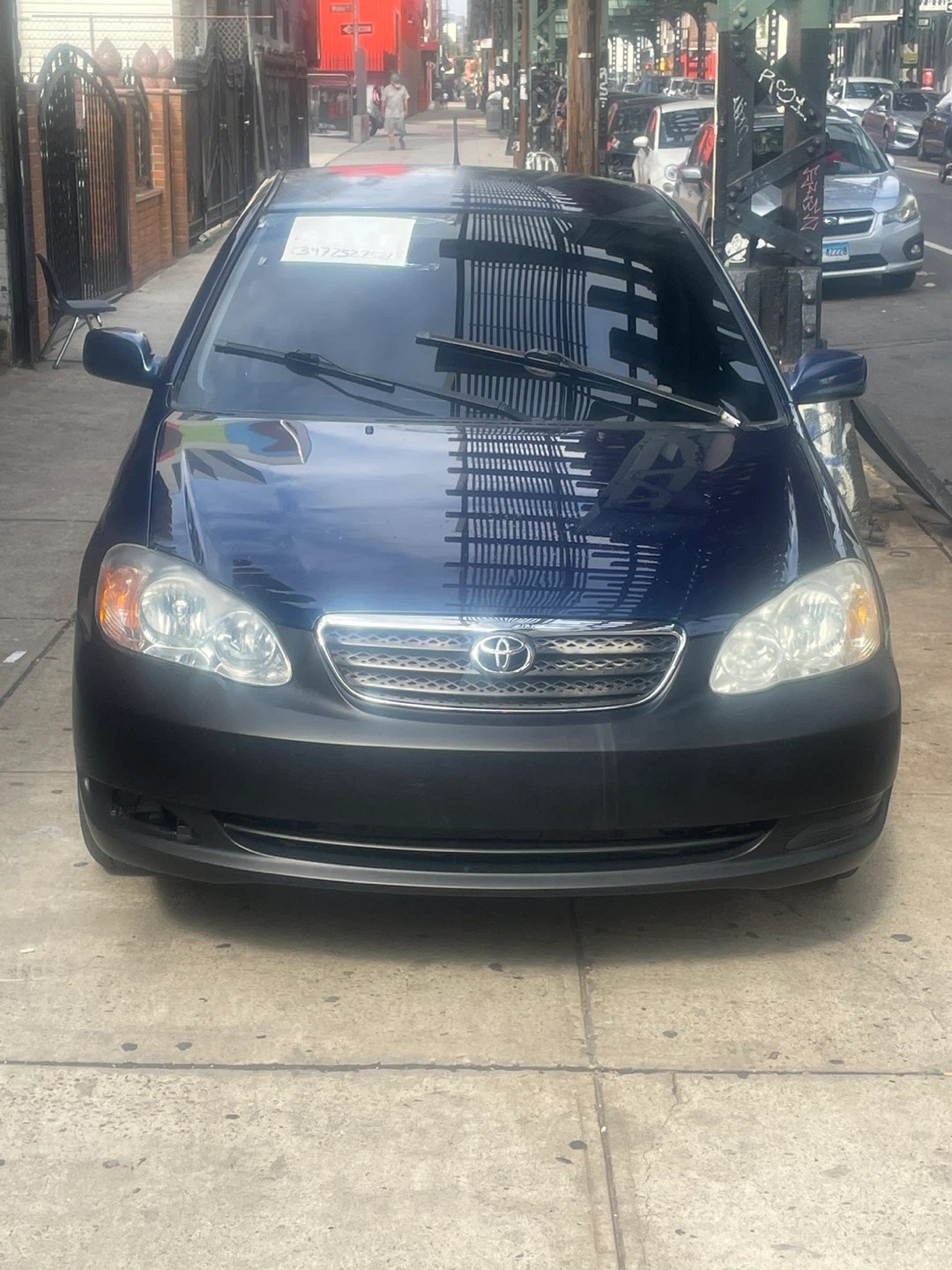 Blue Toyota Sedan - photo 2