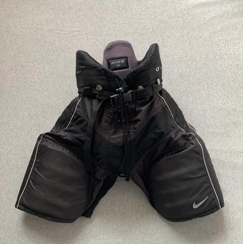 Nike Junior Size Large Hockey Pants - 2 SMALL HOLES IN CROTCH