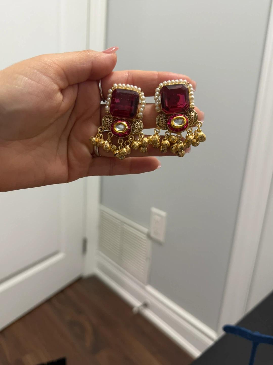 Gold tone Jhumka earrings with red stone - photo 2