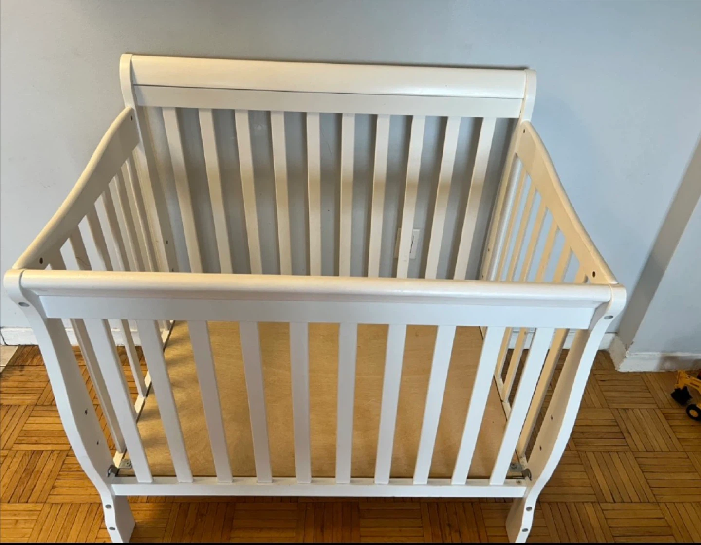 White Wooden mini Crib