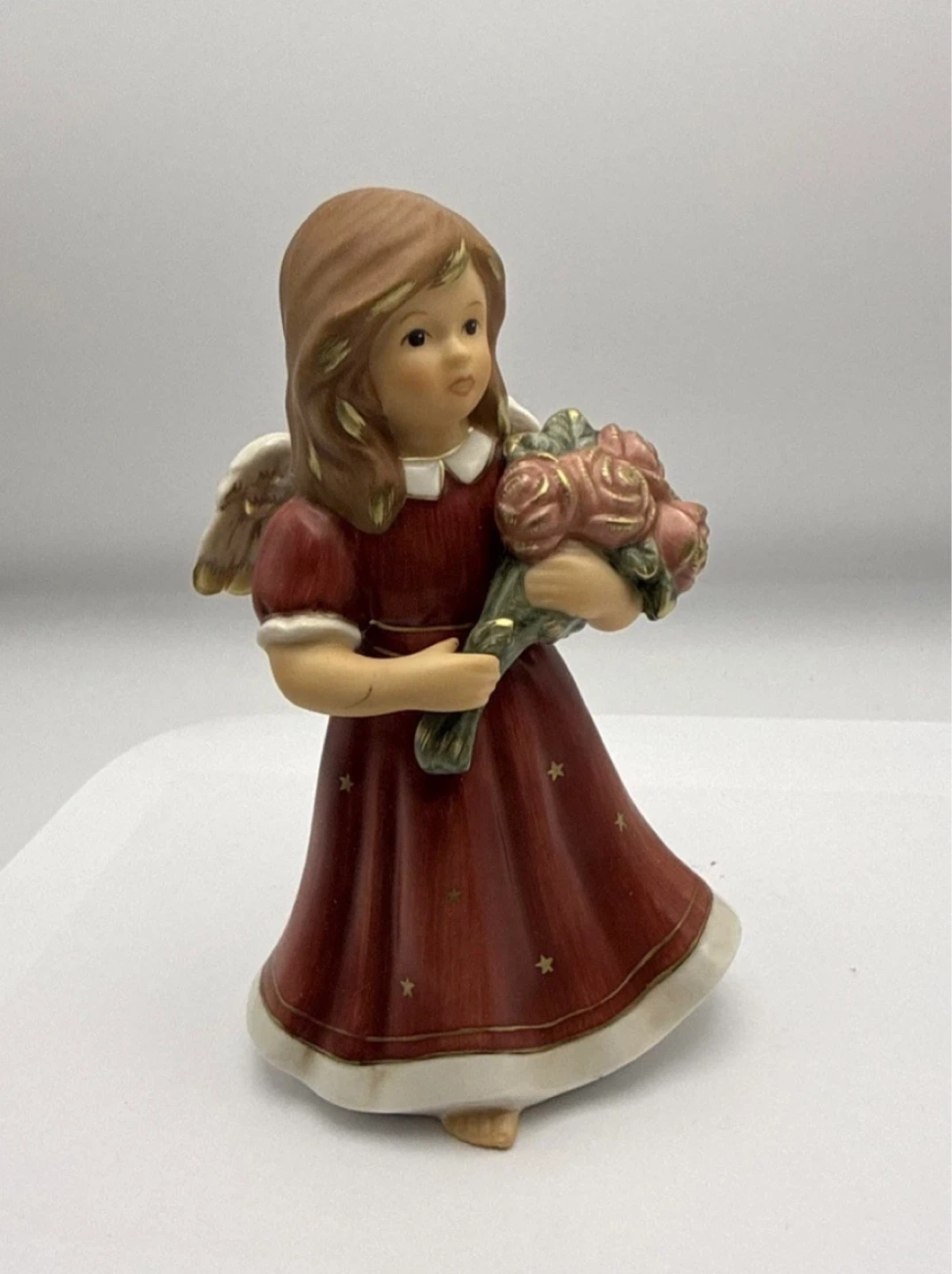 Porcelain Angel Figurine with Flowers - photo 3