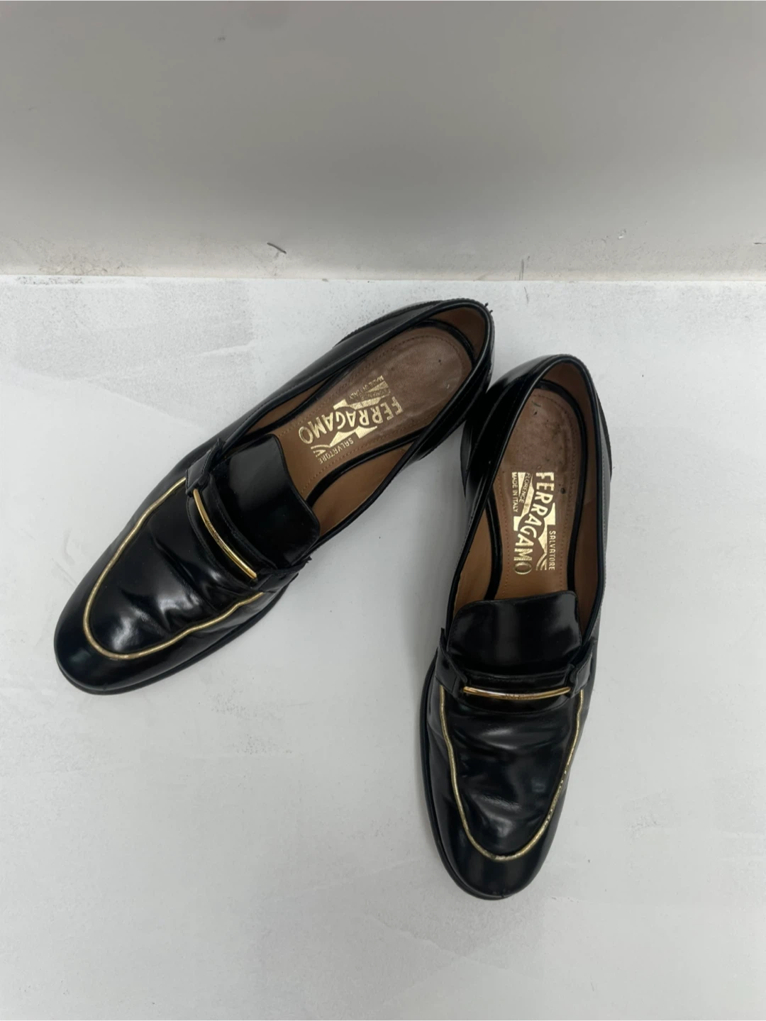 Salvatore Ferragamo Black Leather Loafers with Gold Trim