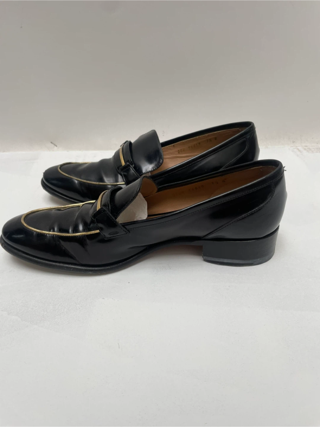 Salvatore Ferragamo Black Leather Loafers with Gold Trim - photo 2