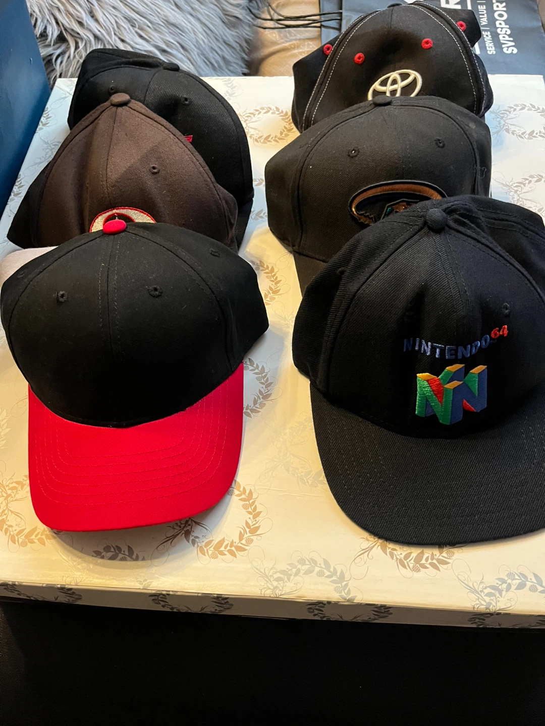 Assorted Baseball Caps - Nintendo 64, Toyota, and more