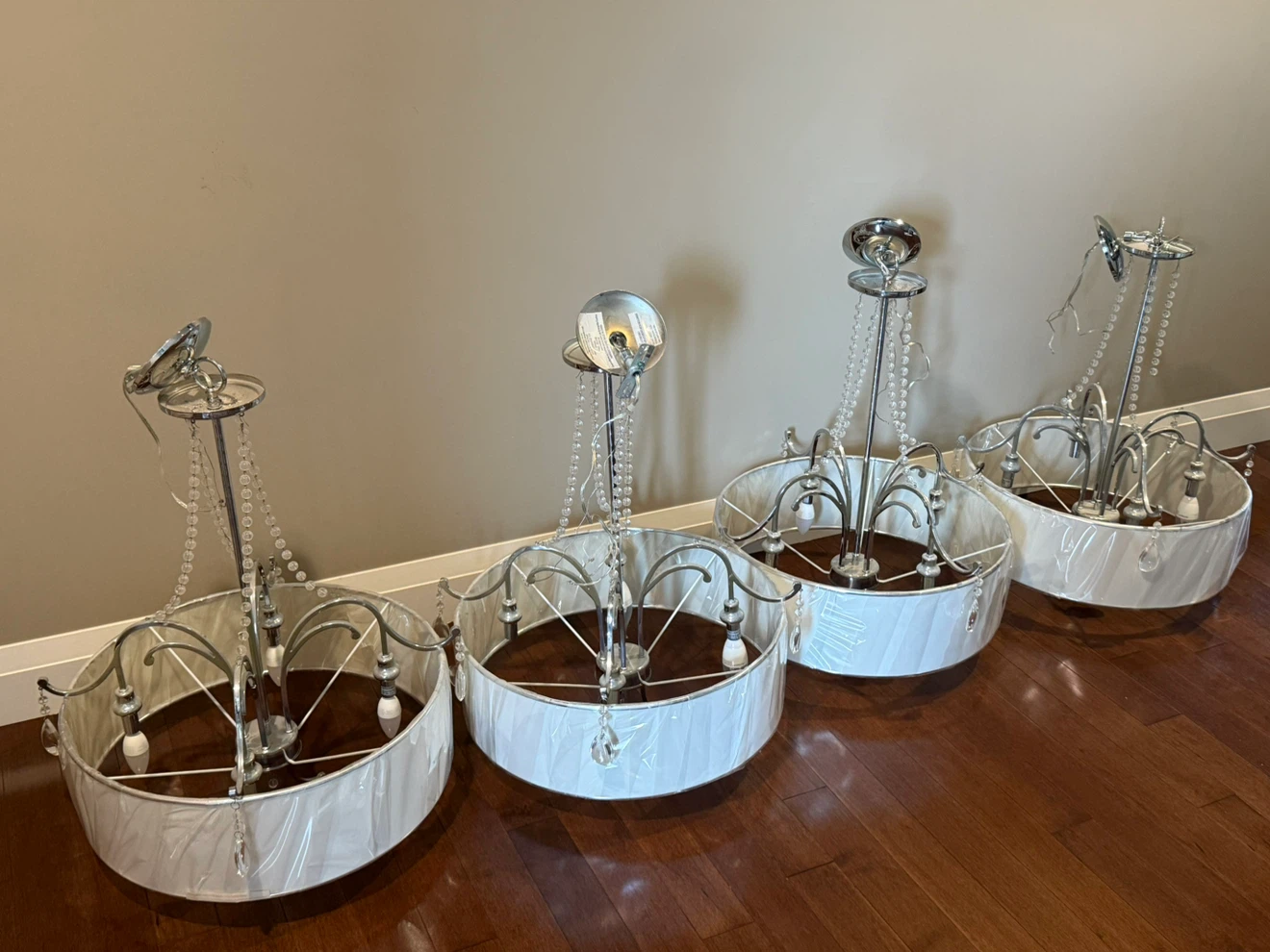 matching modern chrome drum chandeliers/light fixtures.
