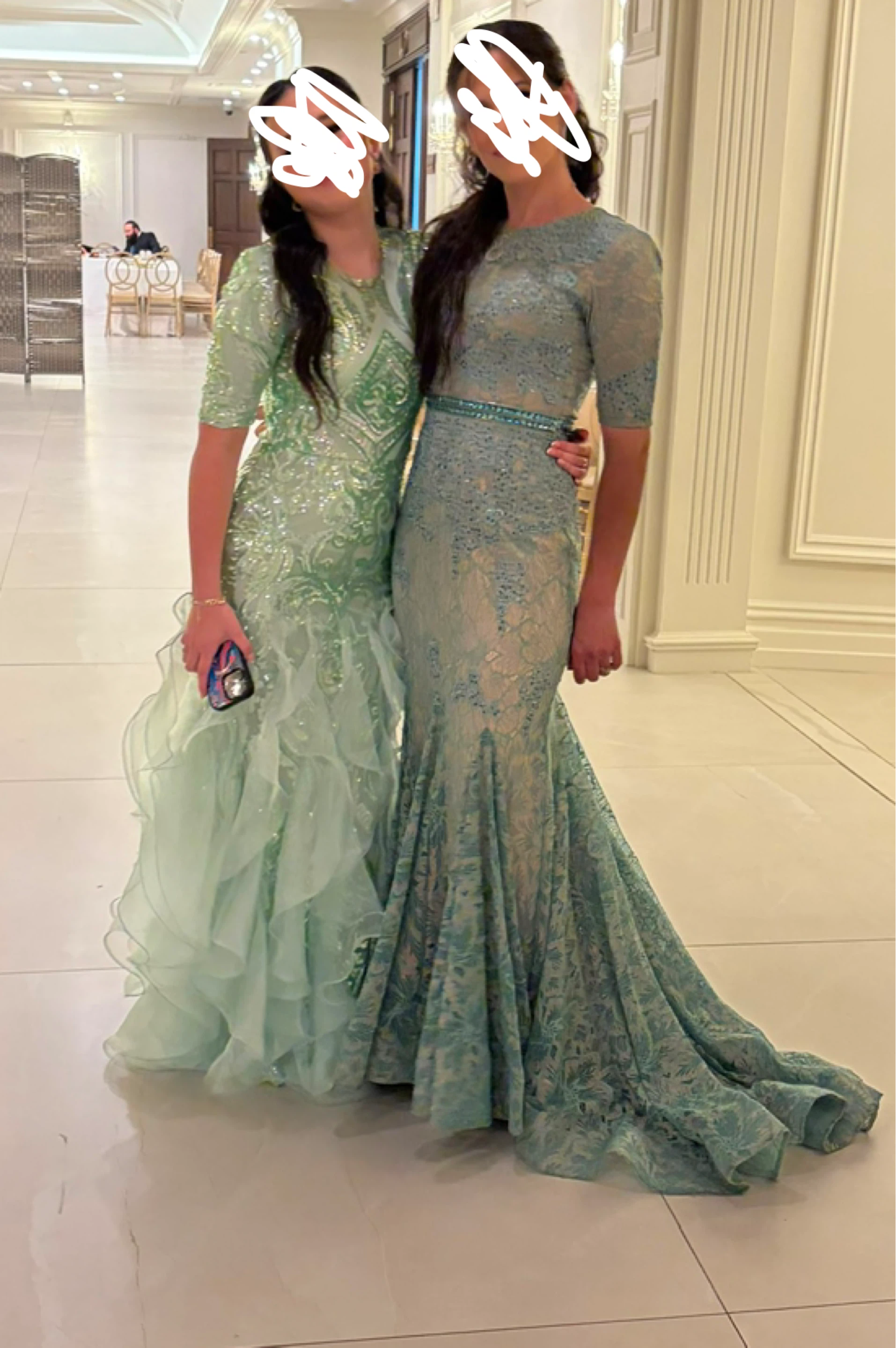 Sparkly Green Sequin Gown with Ruffled Skirt (left)