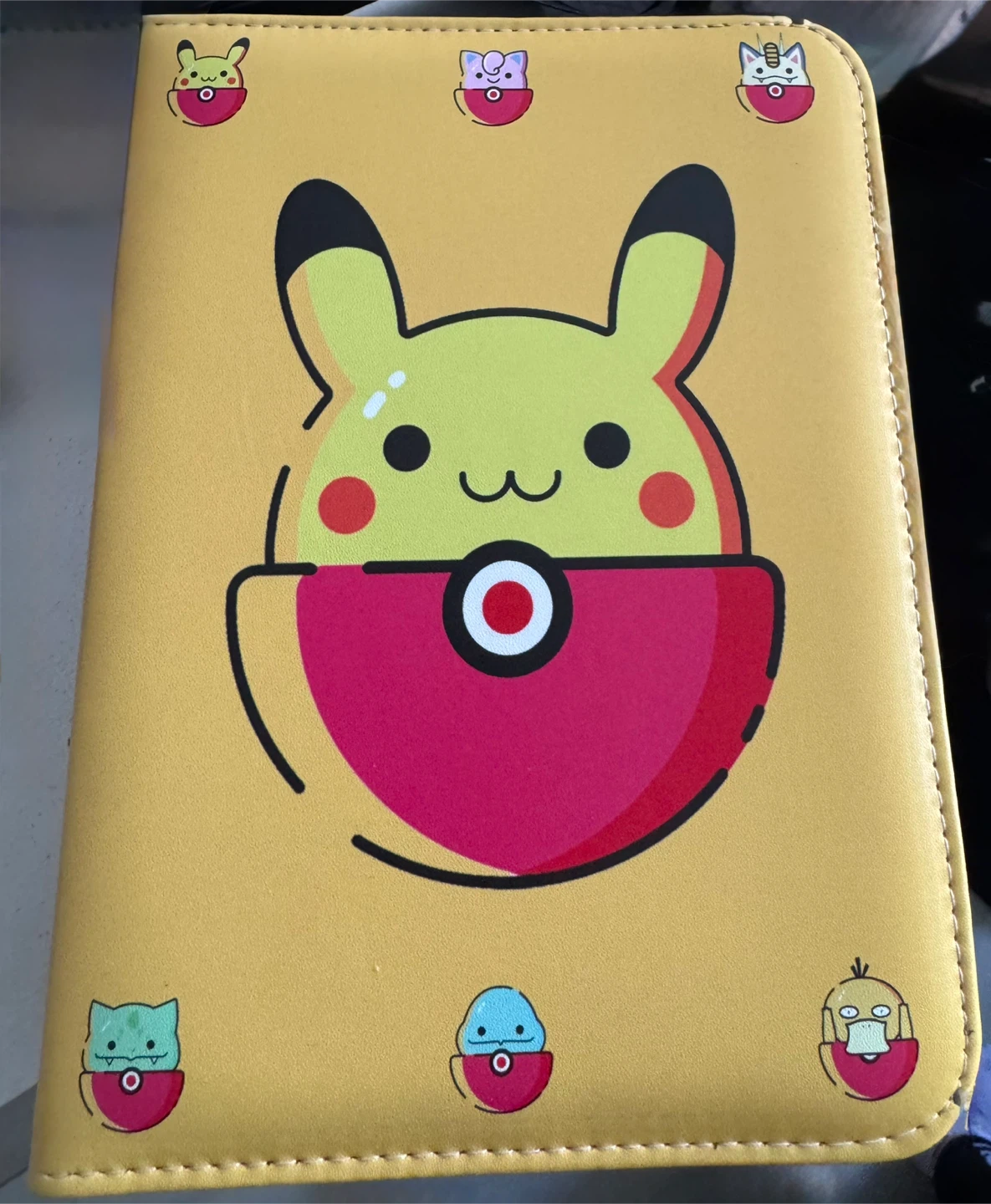 Filled Pokémon card binder