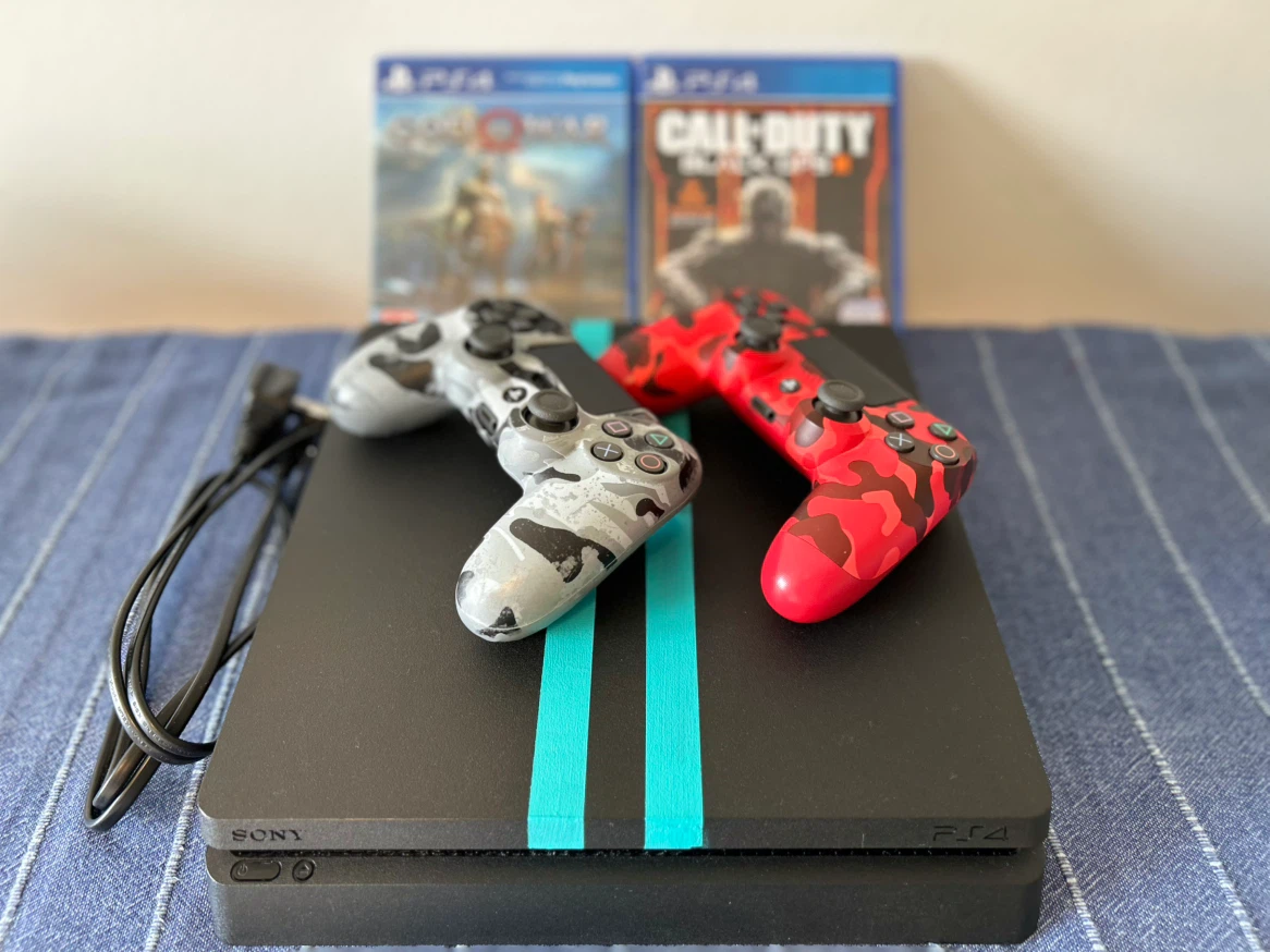 Sony PlayStation 4 Slim Bundle with 2 Games & Controllers