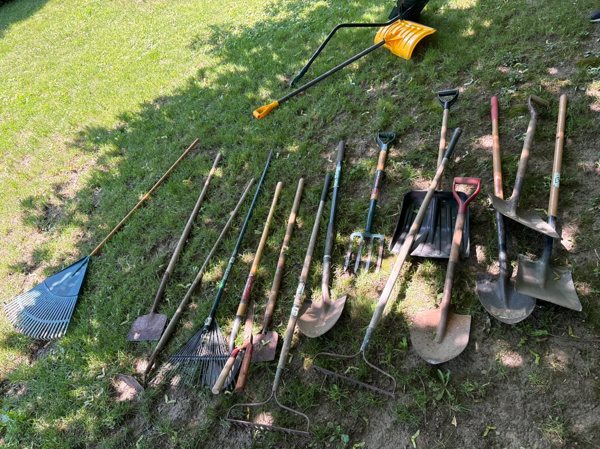 Assorted Garden Tools and Hoses