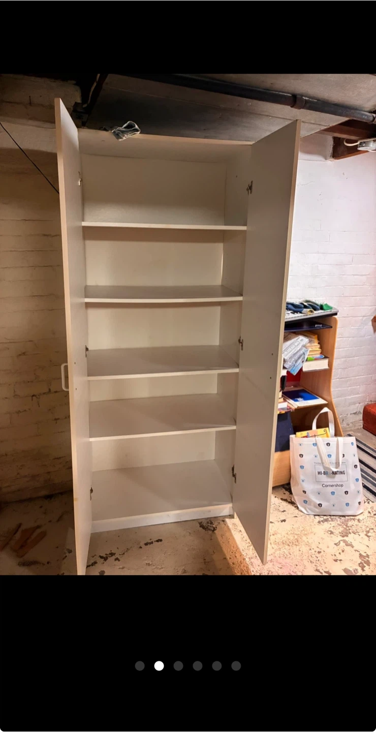 Tall white shelf with 2 doors. - photo 2