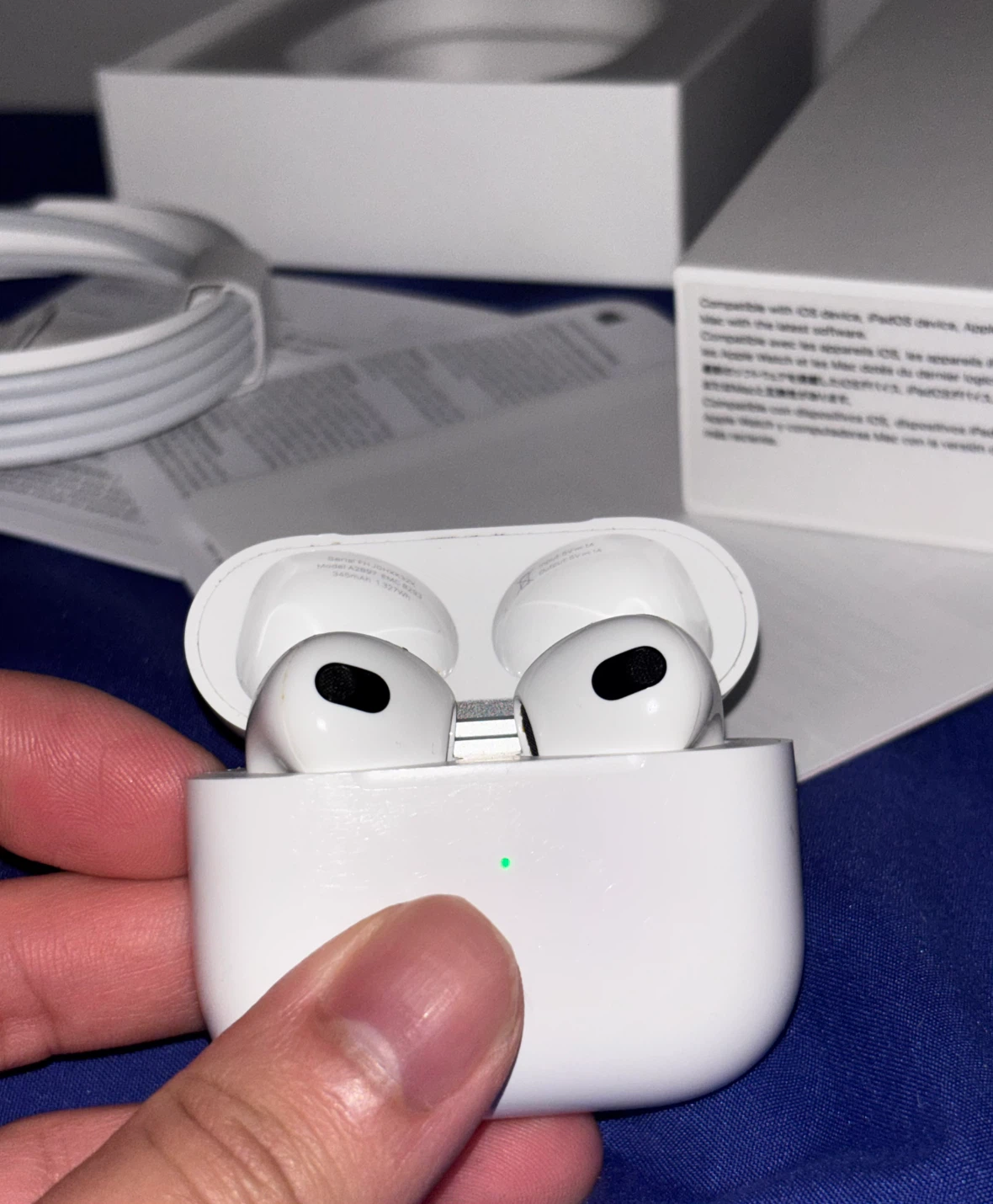 Apple AirPods (3rd generation) swipe for photos