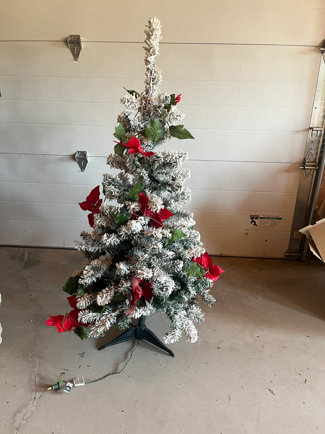 Pre-lit Flocked Christmas Tree with Red Poinsettias