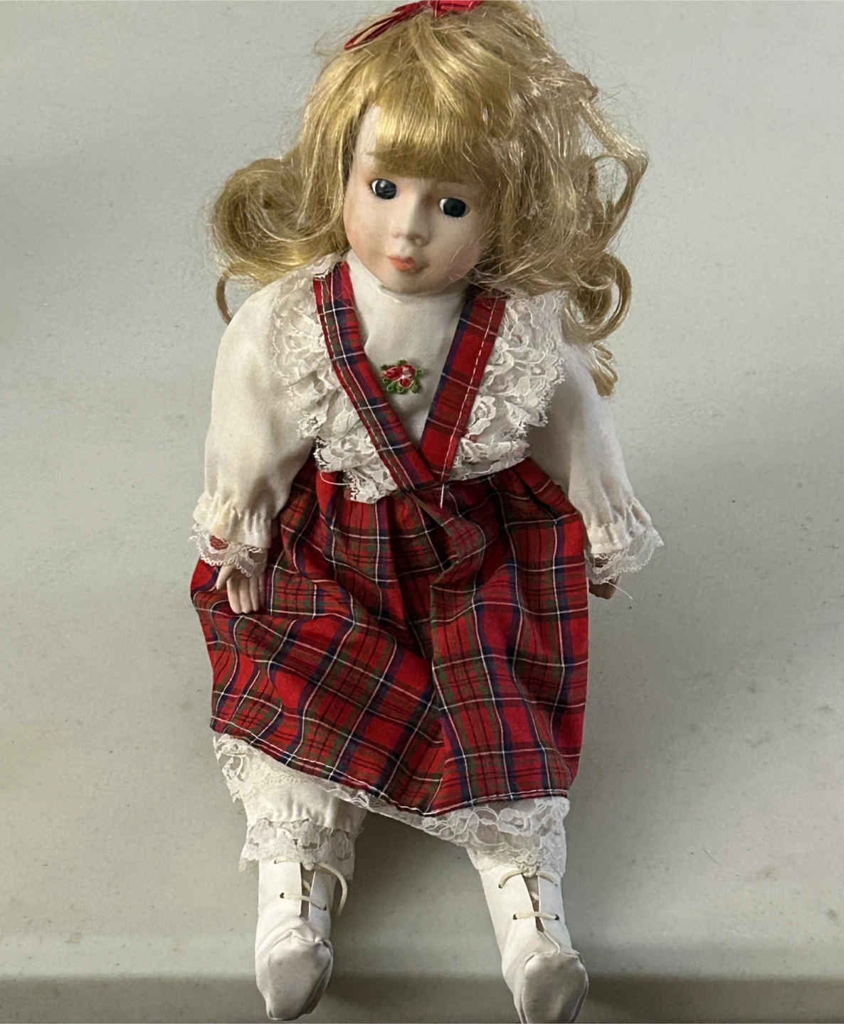 Collector’s Porcelain Doll in Red Plaid Dress