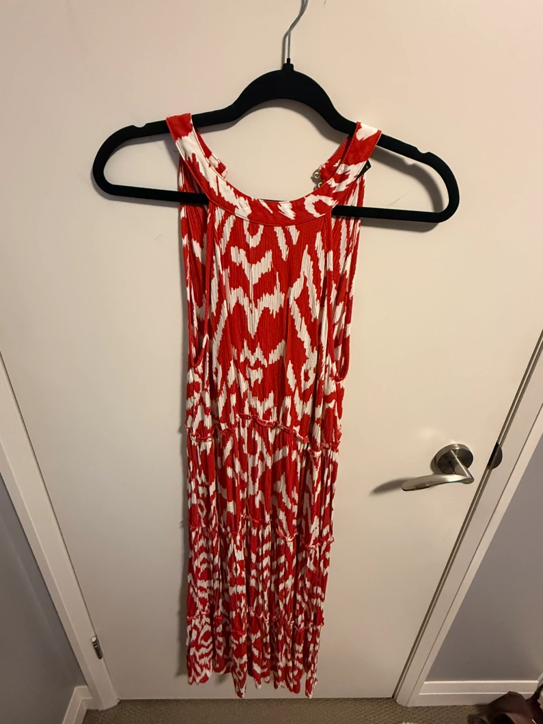 Red and white patterned halter dress