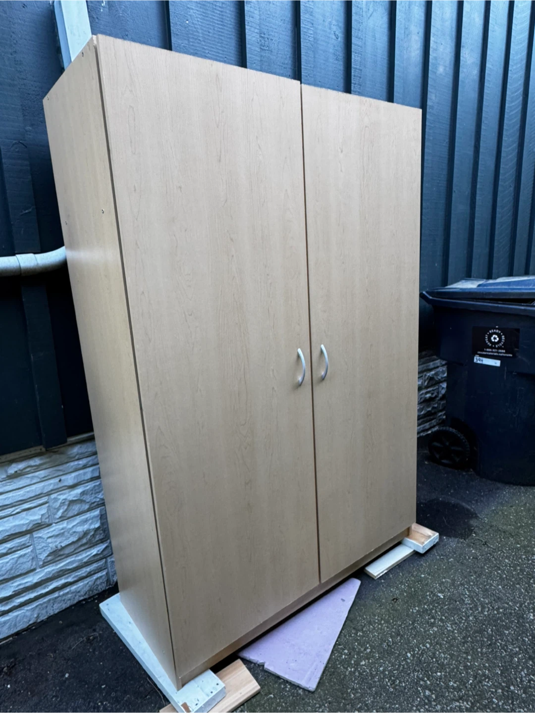 Two-door wardrobe with hanging rail