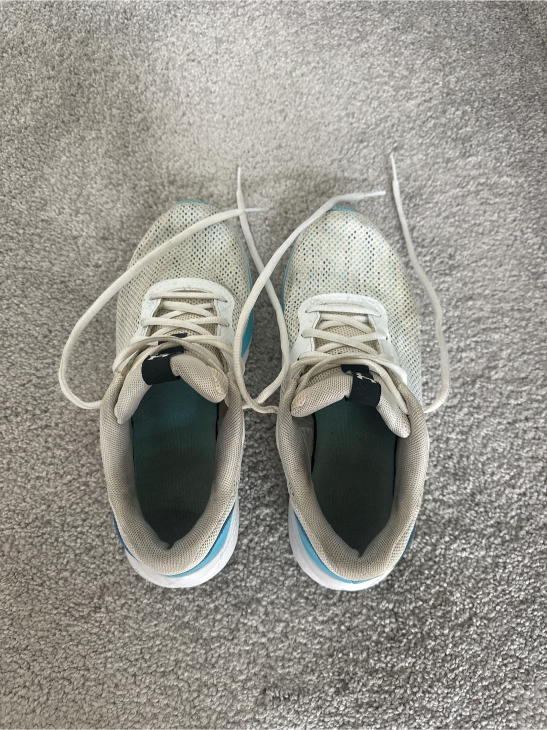 White and blue running shoes