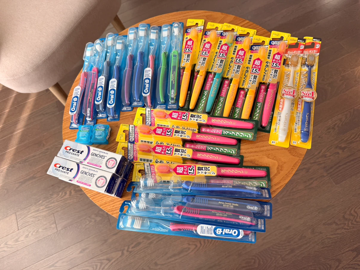 25 Brand New Toothbrushes + FREE Toothpaste & Floss Bundle