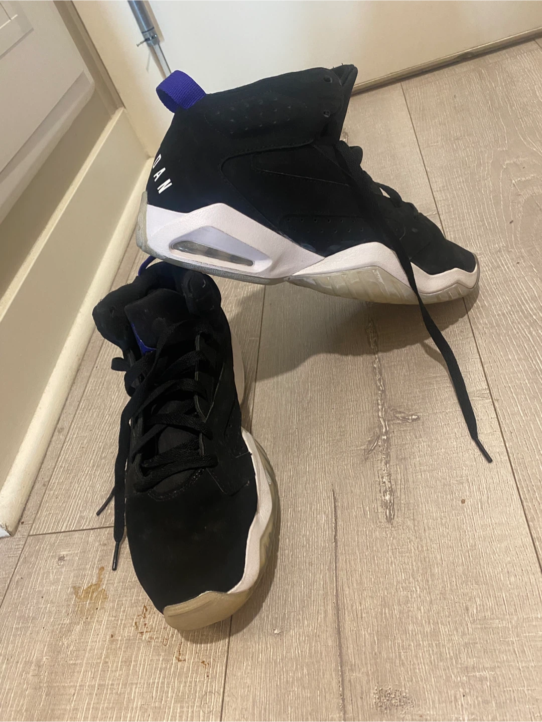 Jordan Black and Purple High Top Sneakers