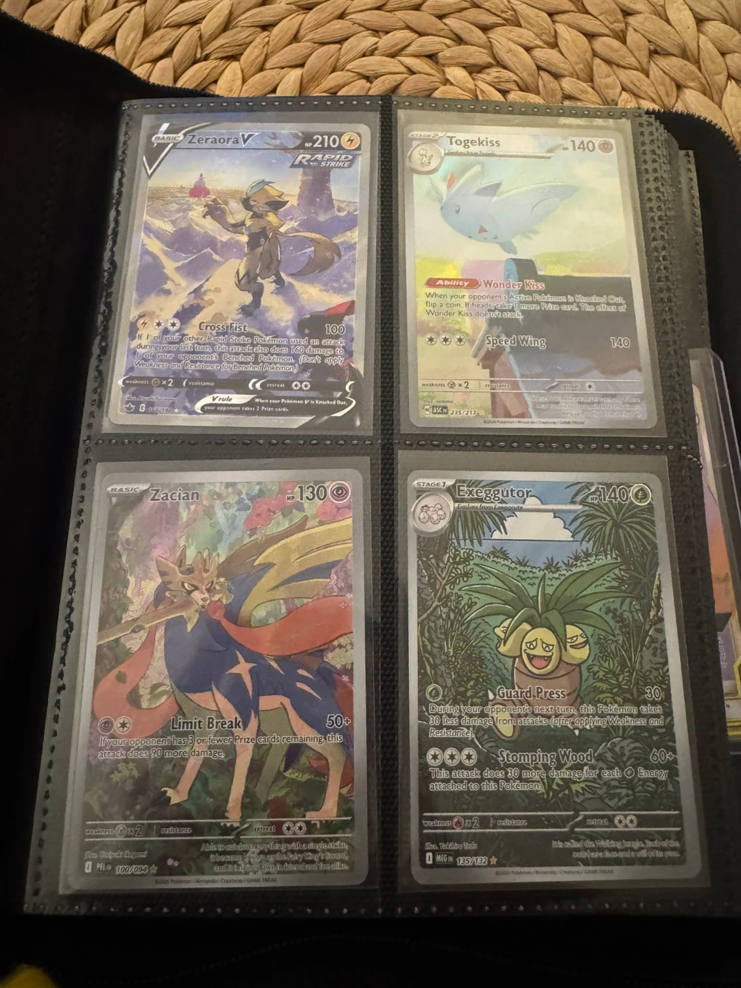 Assorted Pokémon Cards in Binder