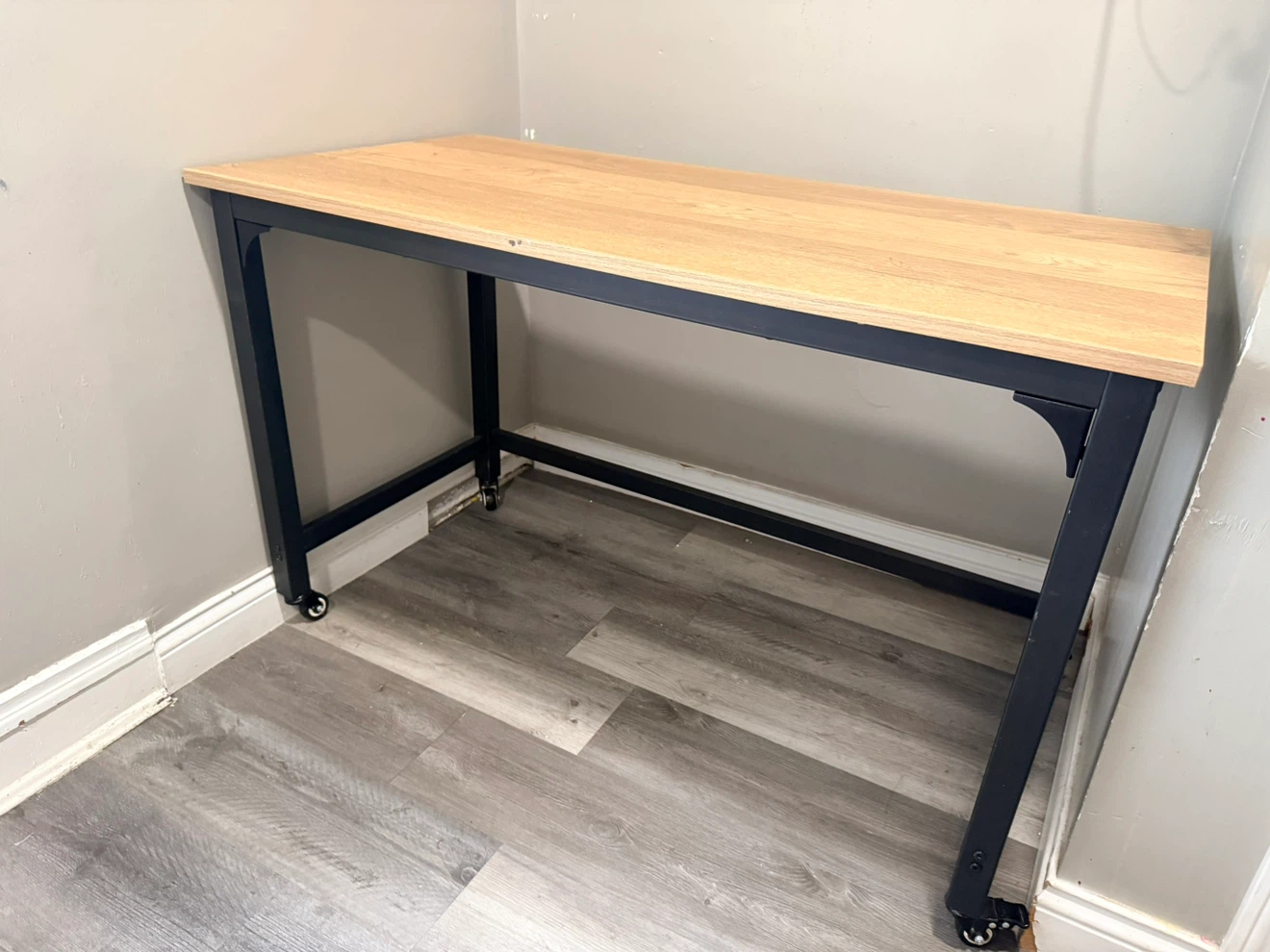 Wooden top desk with black metal frame