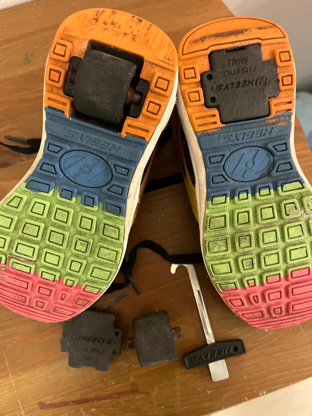 Black wheelies with rainbow accent